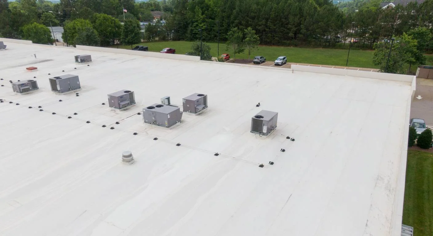 Completed commercial roof restoration project by Chellino Commercial Roofing showcasing like-new condition and cost-effective alternative to replacement